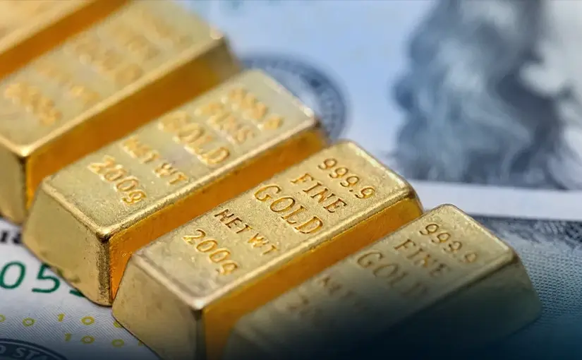 Ouro sob pressão com expectativas de juros mais altos